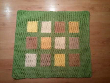 Háčkovaný koberec